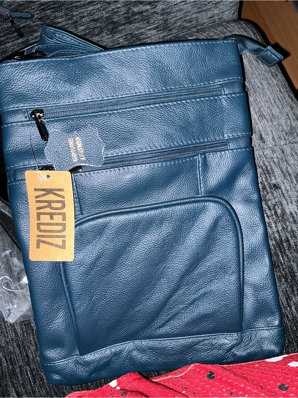 Men's Blue Leather Messenger Bag with Multiple Zip Pockets